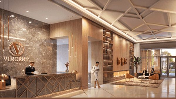 Elegant lobby with concierge desk at Vincent Condominiums, 2851 Highway 7, Vaughan.